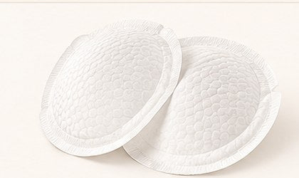 Two single use disposable breast pads