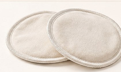 Two washable cloth breast pads