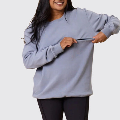 Soft dusty blue nursing sweatshirt worn by a breastfeeding mum with feeding access – Relievoo