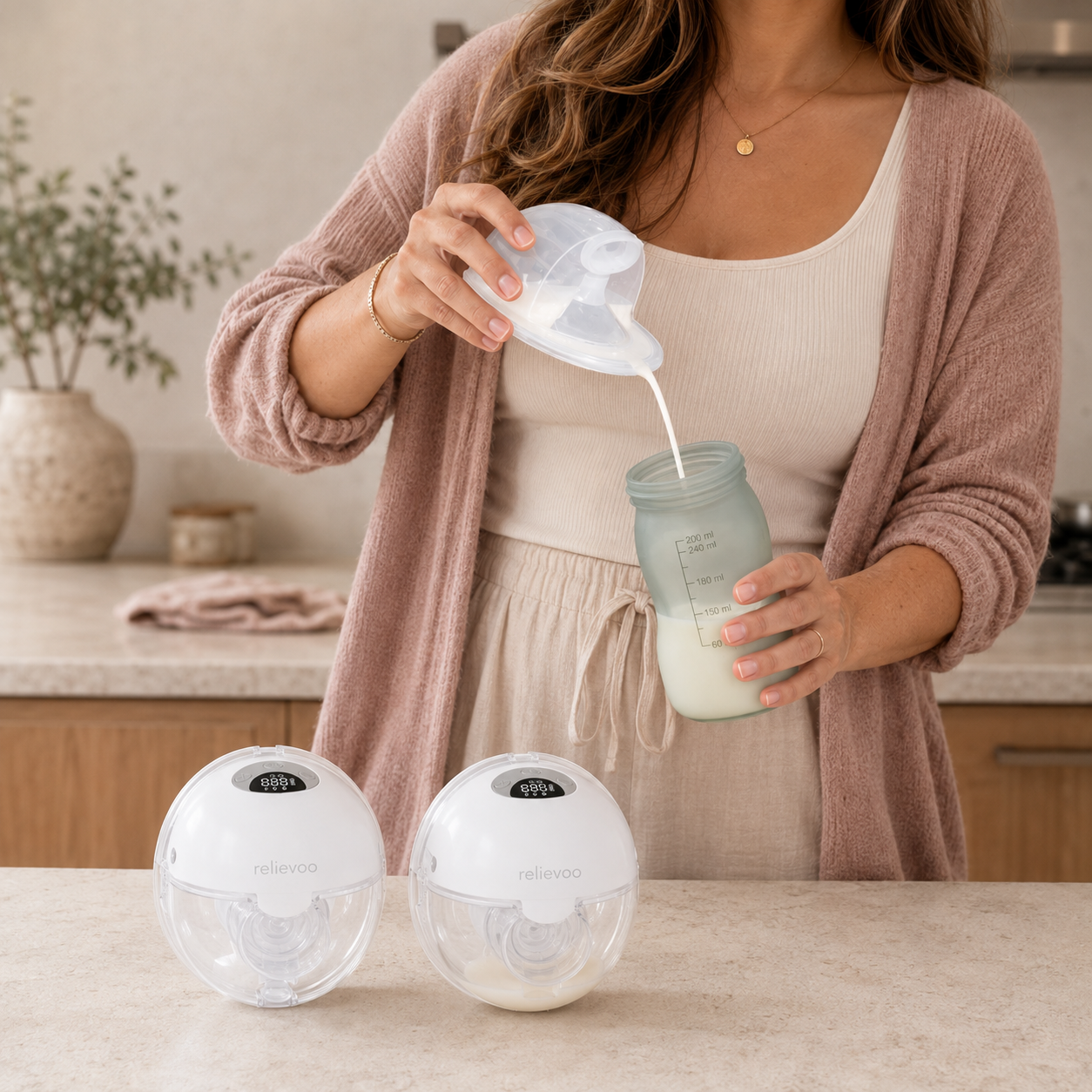 Mum pouring expressed breast milk from a Relievoo M22 PRO2 wearable pump cup into a storage bottle