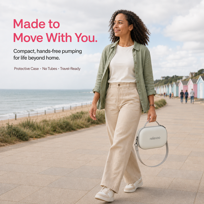 Mum walking along a British seaside promenade carrying the Relievoo M22 PRO2 breast pump in its protective travel case with shoulder strap, compact tube-free hands-free pumping on the go
