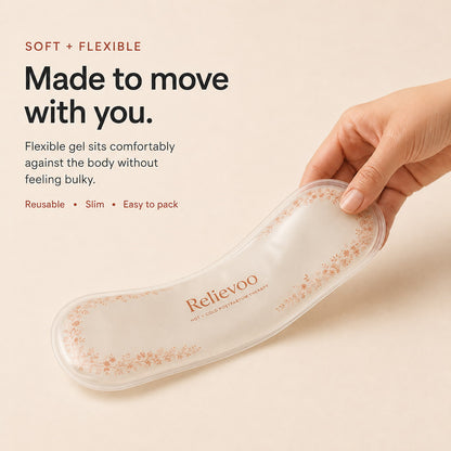Flexible Relievoo perineal therapy pack bending in a hand so it sits comfortably against the body