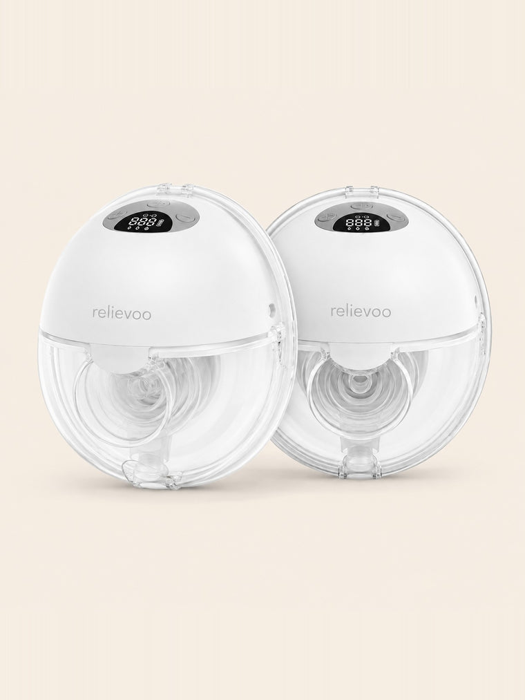 Mum with her baby and the Relievoo wearable breast pump