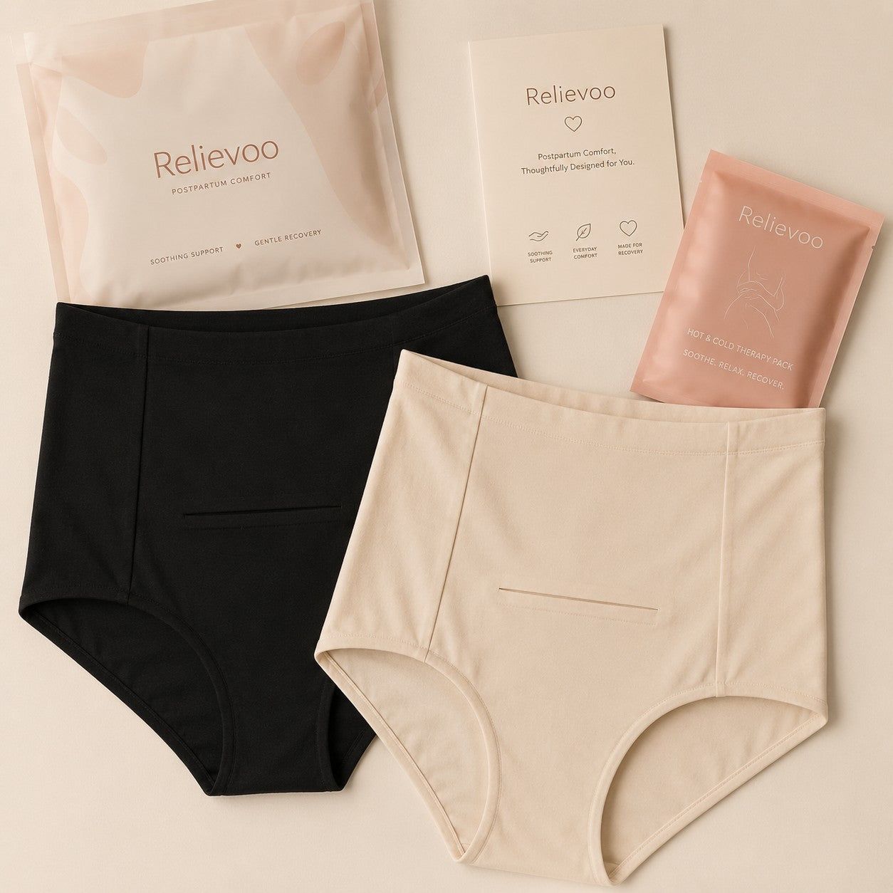 Relievoo Postpartum Soothing Briefs in black and ivory with hot & cold therapy pack and gift packaging