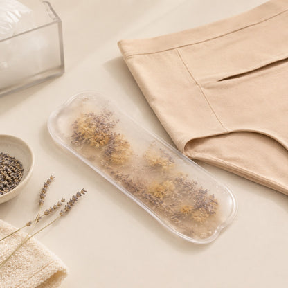 Lavender and chamomile hot & cold therapy pack next to the nude postpartum soothing briefs