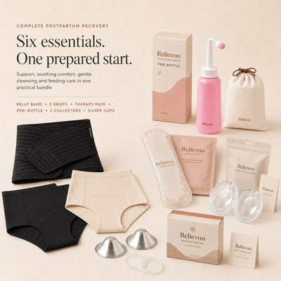 The six Relievoo postpartum recovery essentials laid out together: belly band, two soothing briefs, therapy pack, peri bottle, two milk collectors and silver nursing cups
