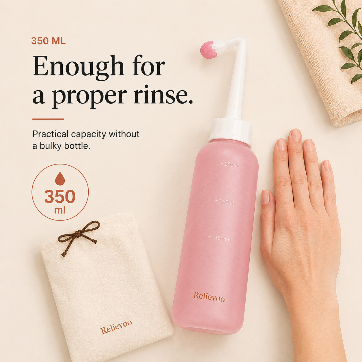 Relievoo peri bottle beside its folded travel pouch with a hand for scale, 350 ml