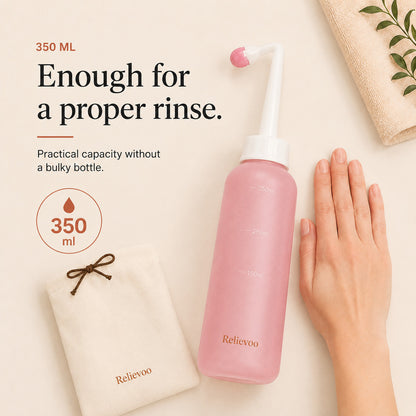 Relievoo peri bottle beside its folded travel pouch with a hand for scale, 350 ml